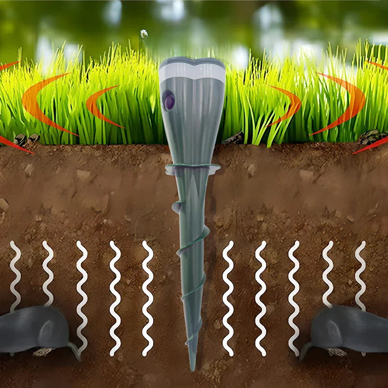 Cutaway of a lawn showing the screw stake in the soil, the vibration spreading sideways underground and the moles turning away